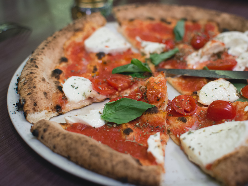 Simple italian pizza
                            with cherry tomatoes